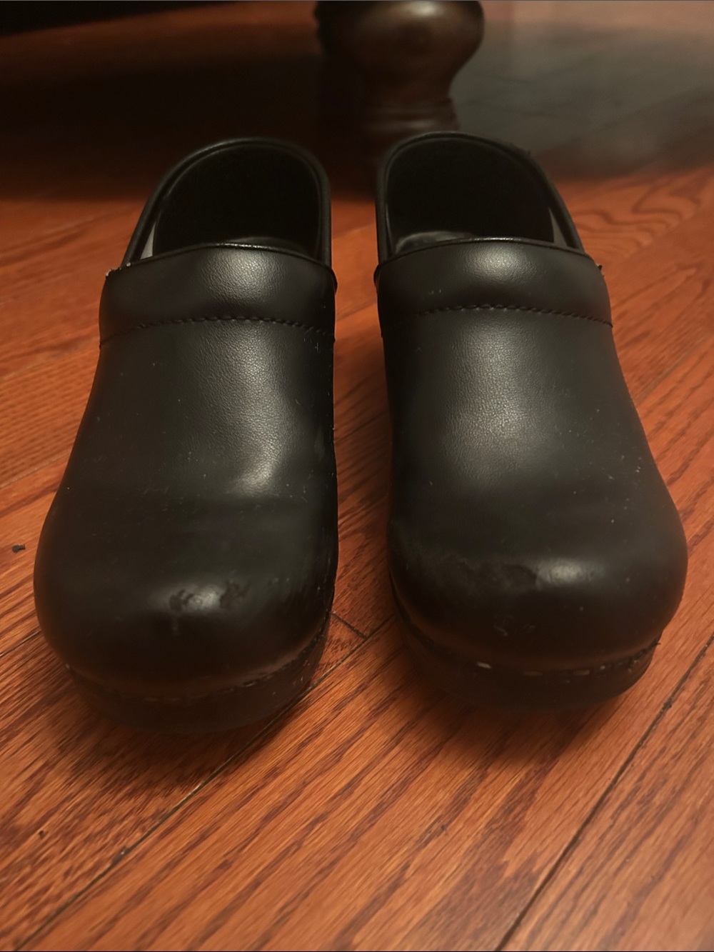 Dansko  Black Leather Slip-On Clogs